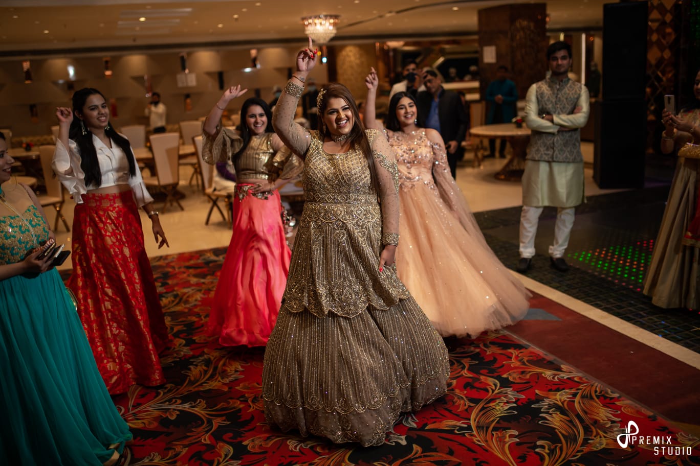bride and bridesmaid dance