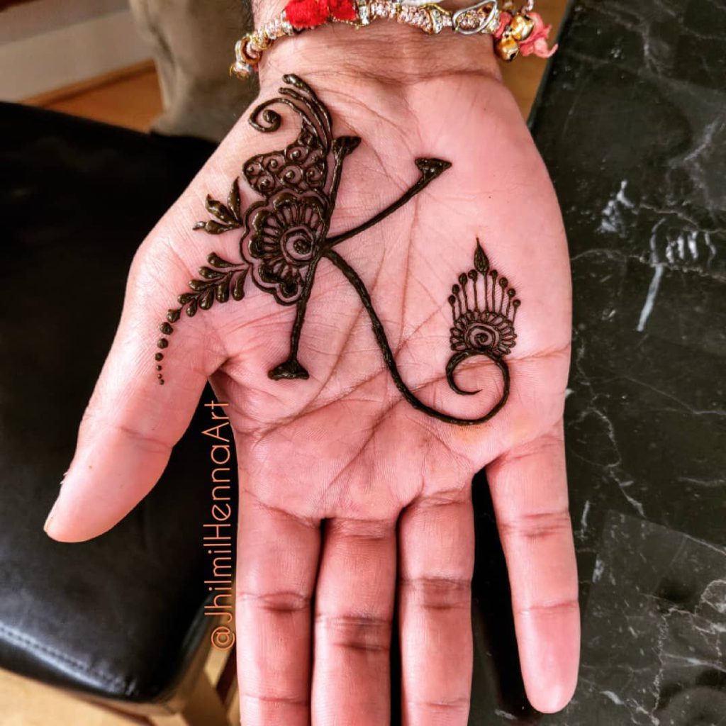 initial on henna