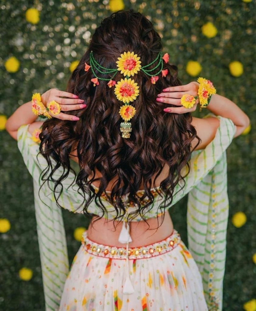 50 trending hairstyles for brides to enliven their mehendi look! 50 trending hairstyles for brides to enliven their mehendi look!