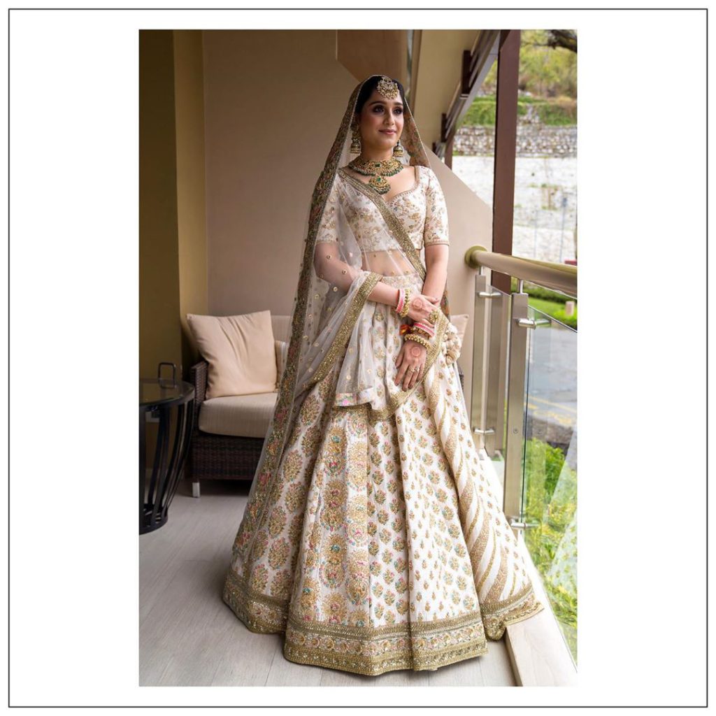 white and gold Sabyasachi lehenga