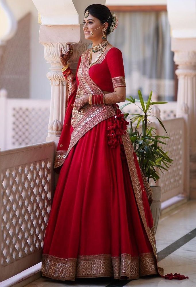 red sabyasachi lehenga